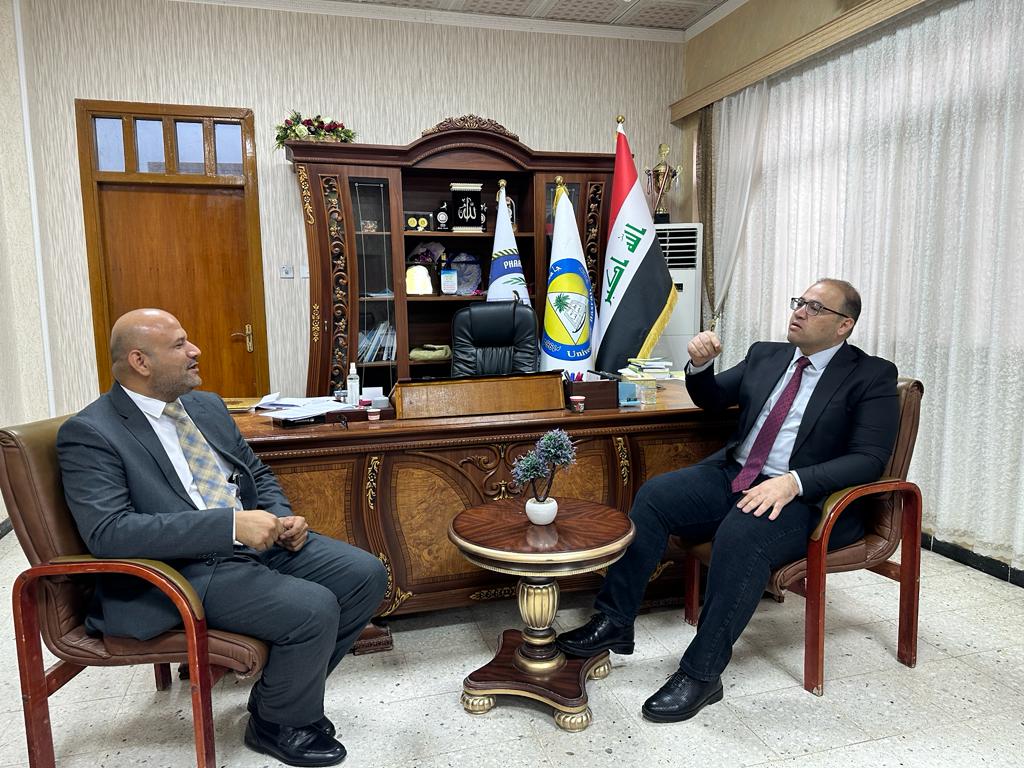 لقاء عميدي كليتي الصيدلة 1